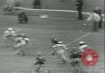 Standbild Football Game Baltimore Maryland USA, 1941, aus Sekunde 9 historischem Filmmaterial Videoclip 65675059335