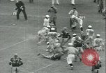 Standbild Football Game Baltimore Maryland USA, 1941, aus Sekunde 12 historischem Filmmaterial Videoclip 65675059335