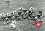 Standbild Football Game Baltimore Maryland USA, 1941, aus Sekunde 13 historischem Filmmaterial Videoclip 65675059335