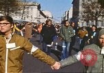 Image of Anti-war protestors in moratorium against Vietnam War Washington DC USA, 1969, second 9 stock footage video 65675059476