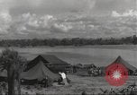 Image Destruction sur l'île Wakde de raid aérien japonais Wakde Island Nouvelle Guinée, 1944, de la seconde 46 séquences d'archives historiques vidéo 65675059508