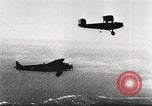 Image of C-2A aircraft midair refueling Los Angeles California USA, 1930, second 8 stock footage video 65675059524