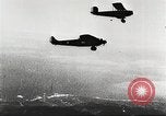 Image of C-2A aircraft midair refueling Los Angeles California USA, 1930, second 21 stock footage video 65675059524