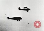 Image of C-2A aircraft midair refueling Los Angeles California USA, 1930, second 42 stock footage video 65675059524