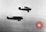 Image of C-2A aircraft midair refueling Los Angeles California USA, 1930, second 44 stock footage video 65675059524