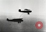 Image of C-2A aircraft midair refueling Los Angeles California USA, 1930, second 46 stock footage video 65675059524
