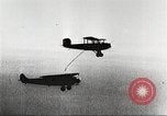 Image of C-2A aircraft midair refueling Los Angeles California USA, 1930, second 47 stock footage video 65675059524