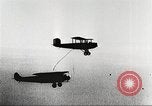 Image of C-2A aircraft midair refueling Los Angeles California USA, 1930, second 48 stock footage video 65675059524