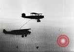 Image of C-2A aircraft midair refueling Los Angeles California USA, 1930, second 50 stock footage video 65675059524