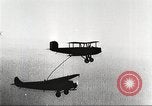 Image of C-2A aircraft midair refueling Los Angeles California USA, 1930, second 58 stock footage video 65675059524