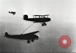 Image of C-2A aircraft midair refueling Los Angeles California USA, 1930, second 60 stock footage video 65675059524