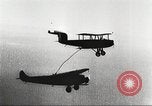 Image of C-2A aircraft midair refueling Los Angeles California USA, 1930, second 61 stock footage video 65675059524