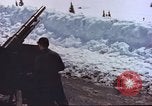 Image of Intentional avalanche at Alta resort Alta Utah USA, 1950, second 18 stock footage video 65675059573