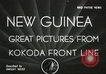 Standbild US Army Air Forces C-53 Flugzeuge drop liefert Kokoda New Guinea, 1942, aus Sekunde 1 historischem Filmmaterial Videoclip 65675059613