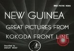 Standbild US Army Air Forces C-53 Flugzeuge drop liefert Kokoda New Guinea, 1942, aus Sekunde 5 historischem Filmmaterial Videoclip 65675059613