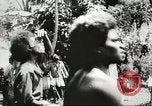 Standbild US Army Air Forces C-53 Flugzeuge drop liefert Kokoda New Guinea, 1942, aus Sekunde 24 historischem Filmmaterial Videoclip 65675059613