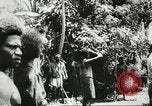 Standbild US Army Air Forces C-53 Flugzeuge drop liefert Kokoda New Guinea, 1942, aus Sekunde 26 historischem Filmmaterial Videoclip 65675059613