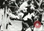 Standbild US Army Air Forces C-53 Flugzeuge drop liefert Kokoda New Guinea, 1942, aus Sekunde 52 historischem Filmmaterial Videoclip 65675059613