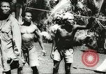 Standbild US Army Air Forces C-53 Flugzeuge drop liefert Kokoda New Guinea, 1942, aus Sekunde 56 historischem Filmmaterial Videoclip 65675059613