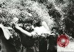 Image Australien blessé soldats au front pendant Seconde Guerre Mondiale Kokoda Nouvelle Guinée, 1942, de la seconde 58 séquences d'archives historiques vidéo 65675059615