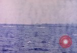 Image of Japanese warplanes attacking American warships Pacific Ocean, 1944, second 47 stock footage video 65675059652
