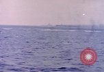 Image of Japanese warplanes attacking American warships Pacific Ocean, 1944, second 50 stock footage video 65675059652