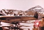 Image of 19th Fighter Squadron P-47 lands on captured airfield Saipan Northern Mariana Islands, 1944, second 20 stock footage video 65675059667
