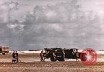 Image of 19th Fighter Squadron P-47 lands on captured airfield Saipan Northern Mariana Islands, 1944, second 21 stock footage video 65675059667