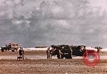 Image of 19th Fighter Squadron P-47 lands on captured airfield Saipan Northern Mariana Islands, 1944, second 24 stock footage video 65675059667
