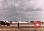 Image of 19th Fighter Squadron P-47 lands on captured airfield Saipan Northern Mariana Islands, 1944, second 30 stock footage video 65675059667