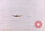 Image of 19th Fighter Squadron P-47 lands on captured airfield Saipan Northern Mariana Islands, 1944, second 50 stock footage video 65675059667
