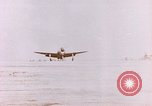 Image of 19th Fighter Squadron P-47 lands on captured airfield Saipan Northern Mariana Islands, 1944, second 52 stock footage video 65675059667