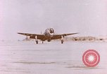 Image of 19th Fighter Squadron P-47 lands on captured airfield Saipan Northern Mariana Islands, 1944, second 55 stock footage video 65675059667