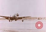 Image of 19th Fighter Squadron P-47 lands on captured airfield Saipan Northern Mariana Islands, 1944, second 56 stock footage video 65675059667