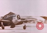 Image of 19th Fighter Squadron P-47 lands on captured airfield Saipan Northern Mariana Islands, 1944, second 58 stock footage video 65675059667