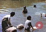 Image of Natives washing clothes in a river Leyte Philippines, 1945, second 24 stock footage video 65675059733