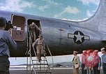 Image of James Forrestal arrives in Honolulu aboard a C-54 aircraft Honolulu Hawaii USA, 1945, second 57 stock footage video 65675059734