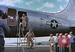 Image of James Forrestal arrives in Honolulu aboard a C-54 aircraft Honolulu Hawaii USA, 1945, second 58 stock footage video 65675059734