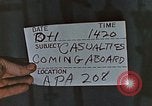 Image of wounded Marines Pacific Ocean, 1945, second 6 stock footage video 65675059750