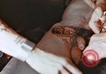 Image of wounded Marines Pacific Ocean, 1945, second 7 stock footage video 65675059750