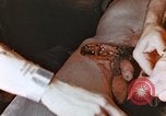 Image of wounded Marines Pacific Ocean, 1945, second 8 stock footage video 65675059750