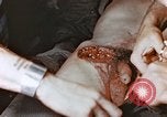 Image of wounded Marines Pacific Ocean, 1945, second 11 stock footage video 65675059750