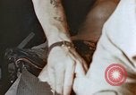 Image of wounded Marines Pacific Ocean, 1945, second 17 stock footage video 65675059750