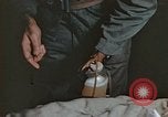 Image of wounded Marines Pacific Ocean, 1945, second 24 stock footage video 65675059750