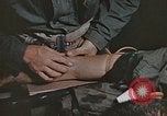 Image of wounded Marines Pacific Ocean, 1945, second 33 stock footage video 65675059750