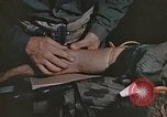Image of wounded Marines Pacific Ocean, 1945, second 35 stock footage video 65675059750
