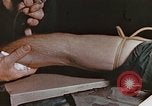 Image of wounded Marines Pacific Ocean, 1945, second 37 stock footage video 65675059750