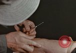 Image of wounded Marines Pacific Ocean, 1945, second 40 stock footage video 65675059750