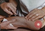 Image of wounded Marines Pacific Ocean, 1945, second 45 stock footage video 65675059750