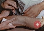Image of wounded Marines Pacific Ocean, 1945, second 47 stock footage video 65675059750